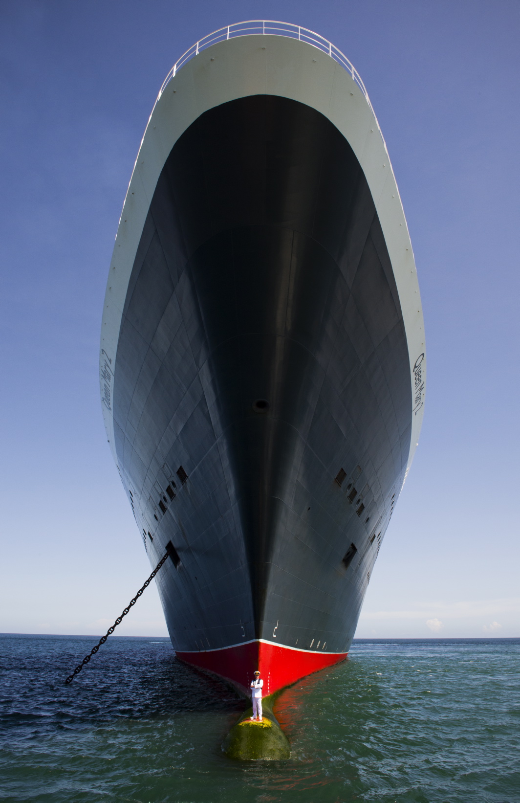 Captain Oprey with Queen Mary 2  - front Mandatory credit James Morgan