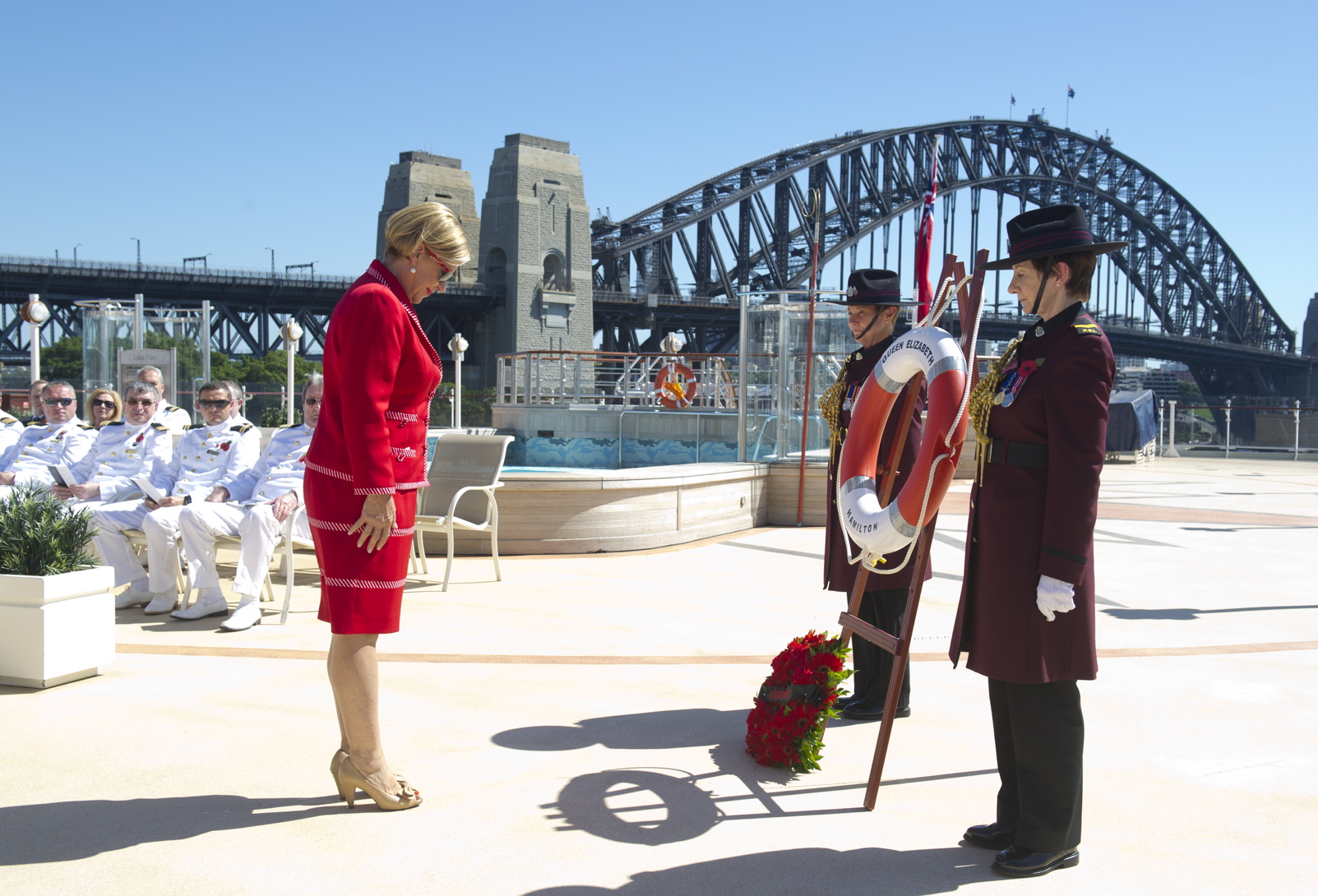 Carnival Australia CEO Ann Sherry lays a wreath at Sydney Anzac service on Queen Elizabeth