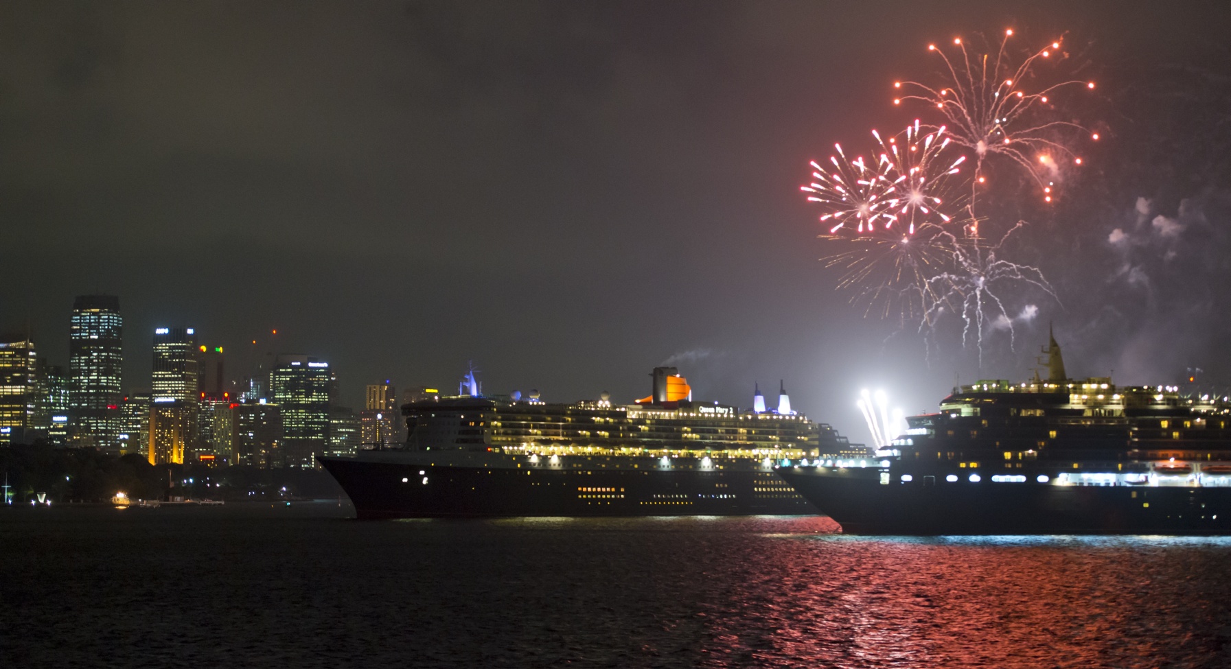 Fireworks light up Sydney as Queen Mary 2 sails by Queen Victoria March 12 2015 Photo by James Morgan 2